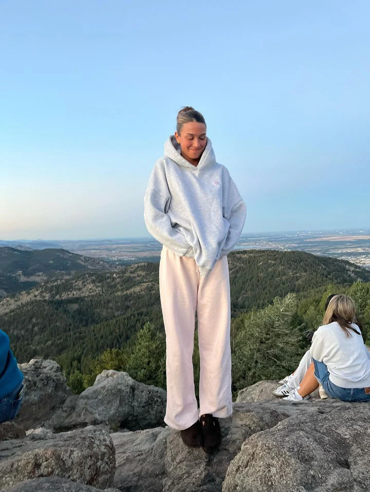 model wearing a grey eleif hoodie.